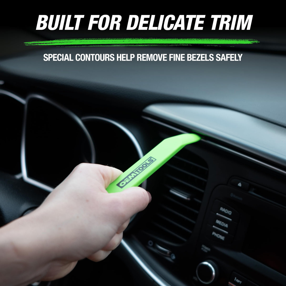 OEMTOOLS held in hand showing scale and ergonomic control for safe prying