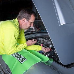 OEMTOOLS tester attached to radiator showing in-situ leak detection and inspection