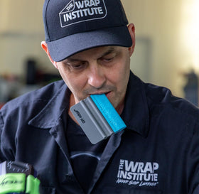 Off-Wrap squeegees used on a vehicle wrap demonstrating smooth bubble-free application