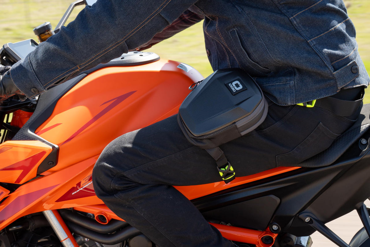 OGIO leg bag worn on thigh demonstrating secure, hands-free carry and quick access