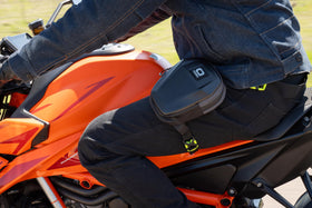 OGIO leg bag worn on thigh demonstrating secure, hands-free carry and quick access