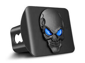OGYE skull close-up with blue eye accent highlighting finish detail and durability