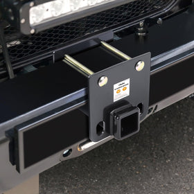Ohuhu in use with a bike rack showing practical cargo mounting and space-saving benefit