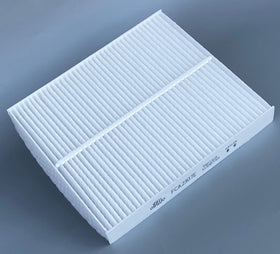 OIFILLIO filter being installed in a truck cabin for quick maintenance benefit
