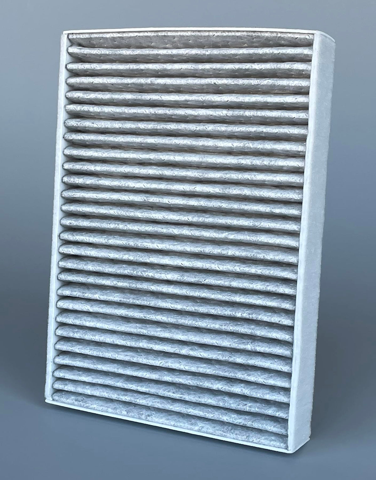 OIFILLIO filter installed in BMW HVAC housing for fast direct-fit replacement