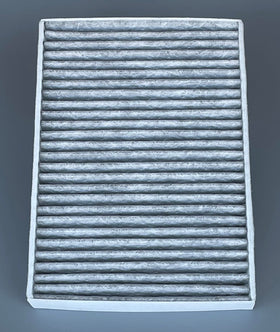 OIFILLIO filter next to ruler showing precise OEM-sized dimensions