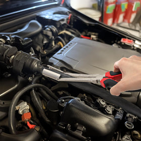 Okllen tools with wrench for scale showing compact toolbox convenience
