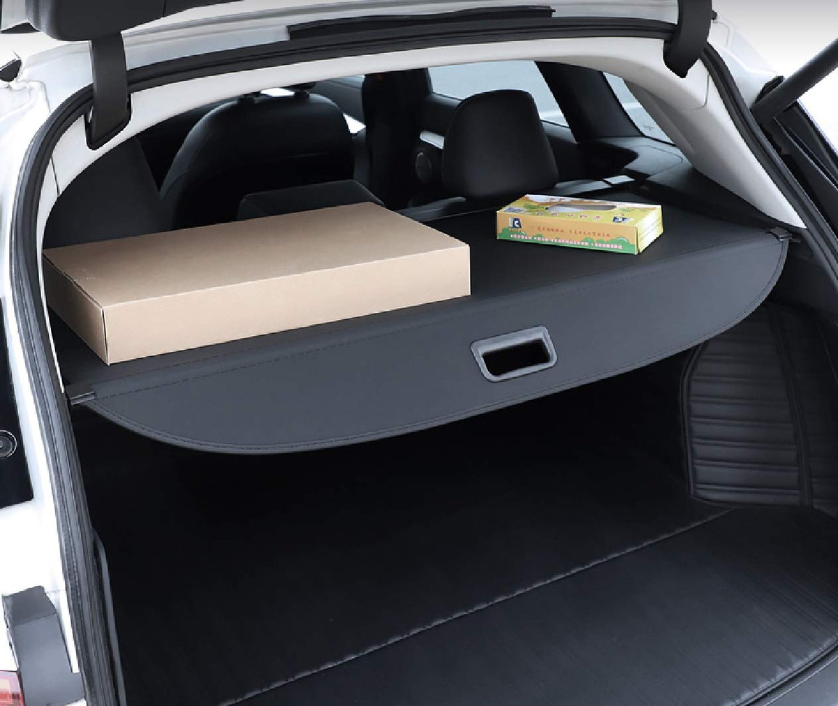 Okutech scale comparison in Passport trunk showing compact storage and space-saving benefit