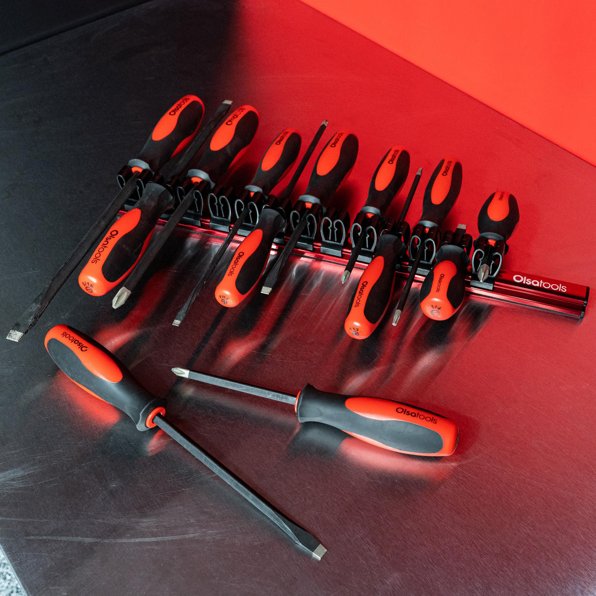 Olsa Tools next to ruler for scale showing compact size and space-saving benefit