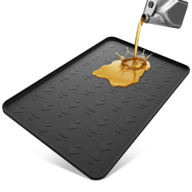 OPSOOPI front view of black silicone drip pan showing full coverage and protection