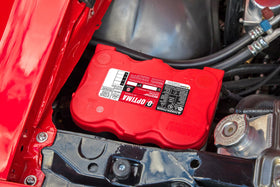 OPTIMA REDTOP 6V undergoing vibration test to show rugged shock resistance