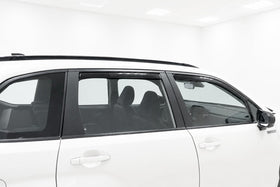 Optimal Co hands sliding visor into channel showing tool-free quick installation