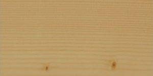 Close-up of Osmo Polyx-Oil being rolled onto wood showing smooth, protective finish