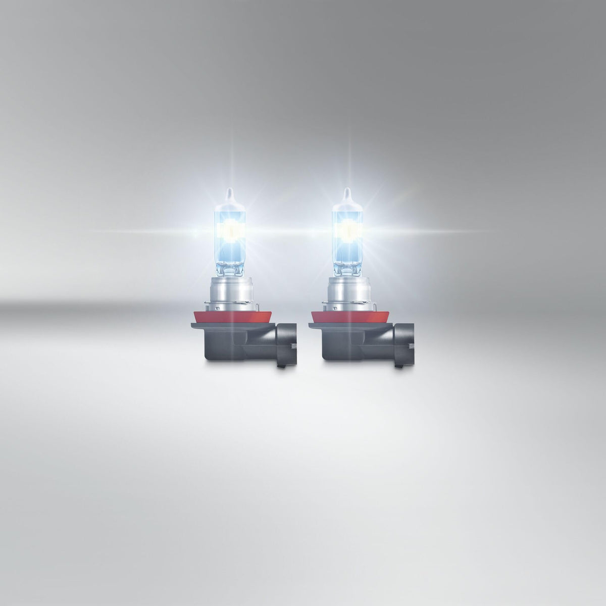 OSRAM NIGHT BREAKER LASER H11 beam lighting a dark road for improved visibility