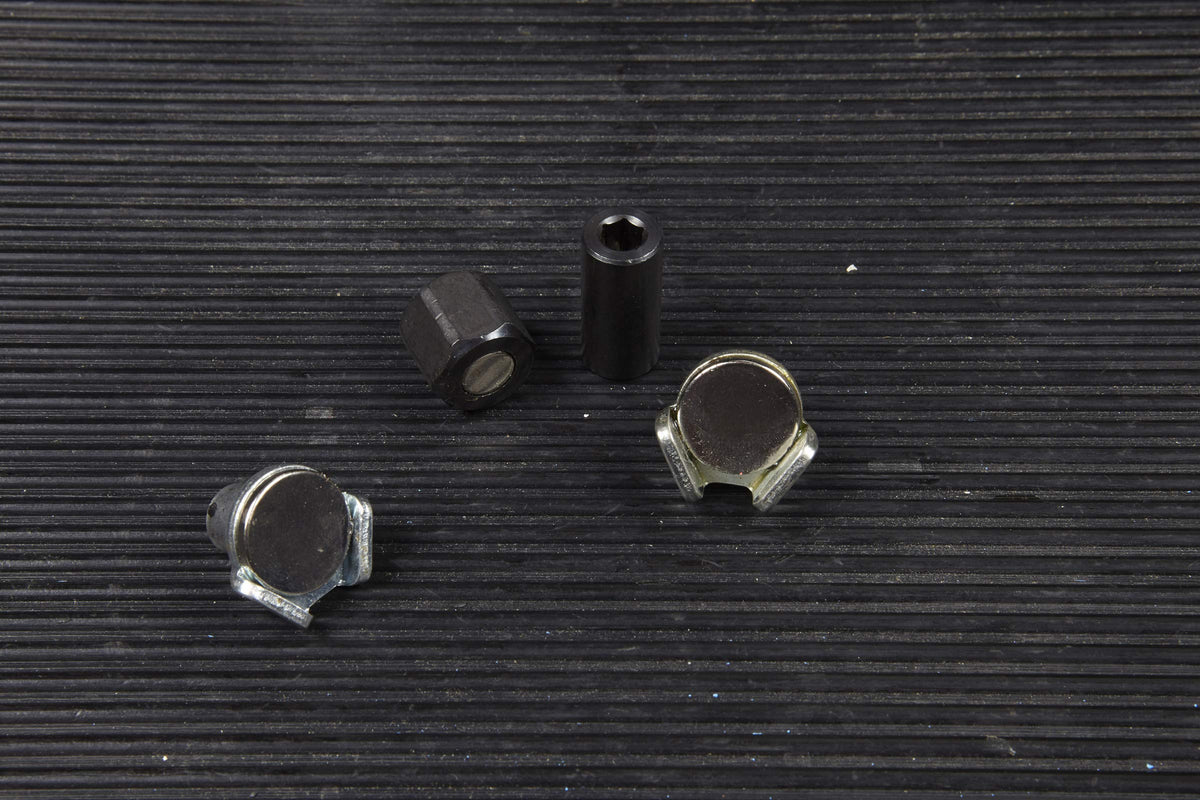 OTC 5961 close-up of three patented attachments for multiple plug types