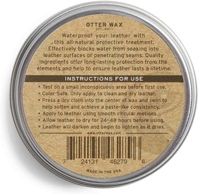 Close-up of Otter Wax texture showing beeswax-lanolin blend for smooth conditioning