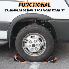 OULEME chock in use against an RV tire showing reliable wheel stabilization