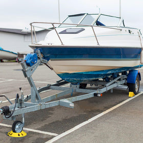 OULEME chocks with single 6" caster in use preventing wheel sinkage