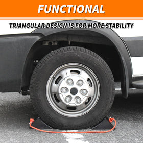 OULEME chock in use with RV tire demonstrating wheel stabilization benefit