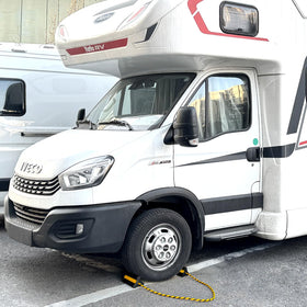 OULEME chock next to a hand showing scale and portable convenience