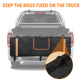 Oulisen pad carrying three bikes on a pickup tailgate demonstrating secure transport