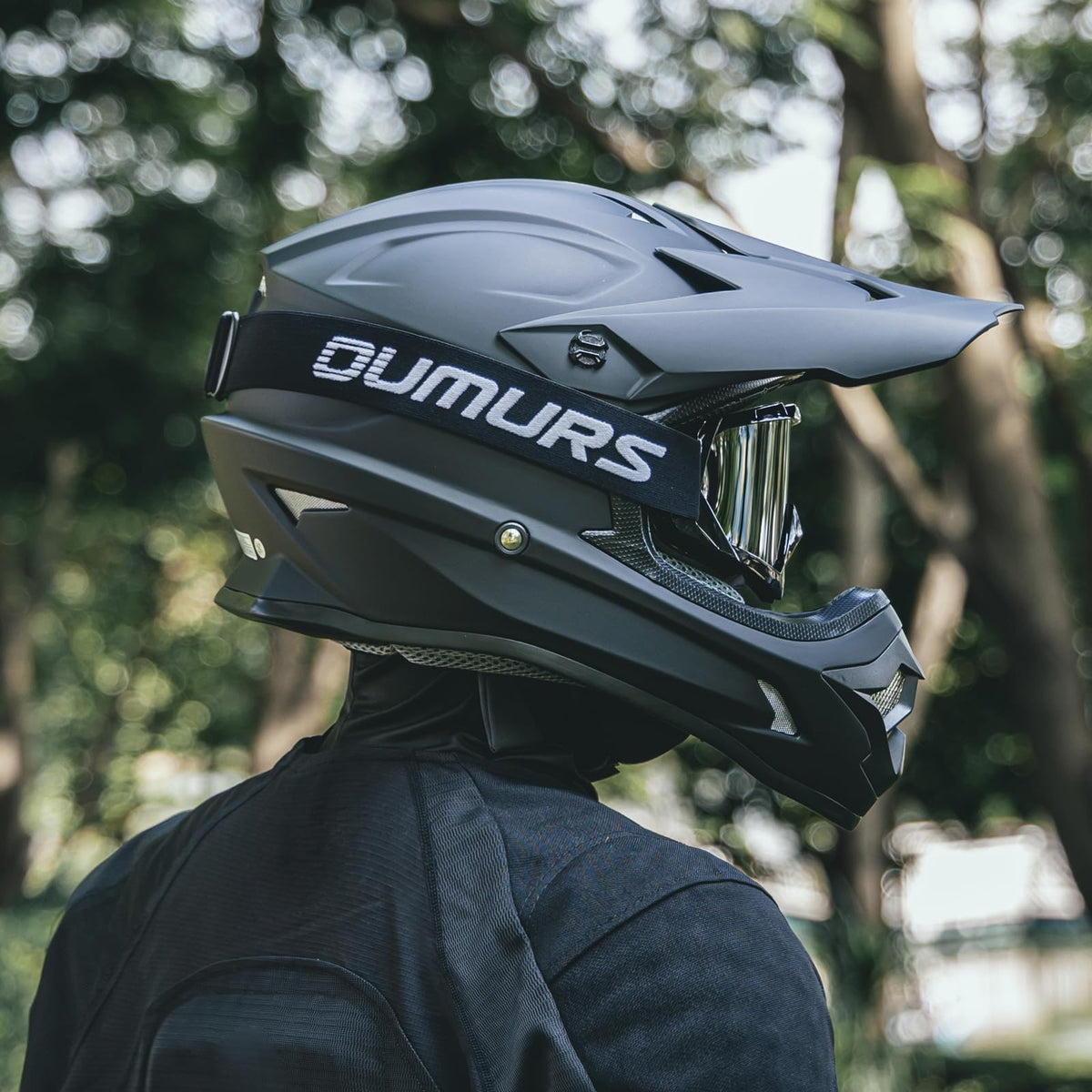 Oumurs helmet in use on offroad trail demonstrating protection and fit