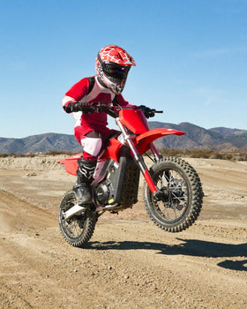 Oumurs youth helmet worn by child on dirt trail demonstrating comfort