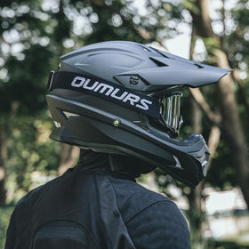 OUMURS helmet next to measuring tape showing size M head circumference fit