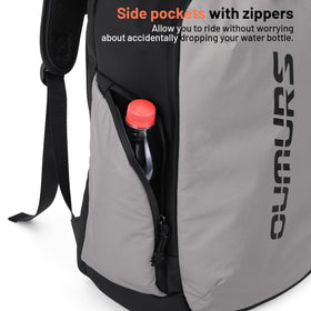 Oumurs padded tech compartment securing a laptop and tablet during travel