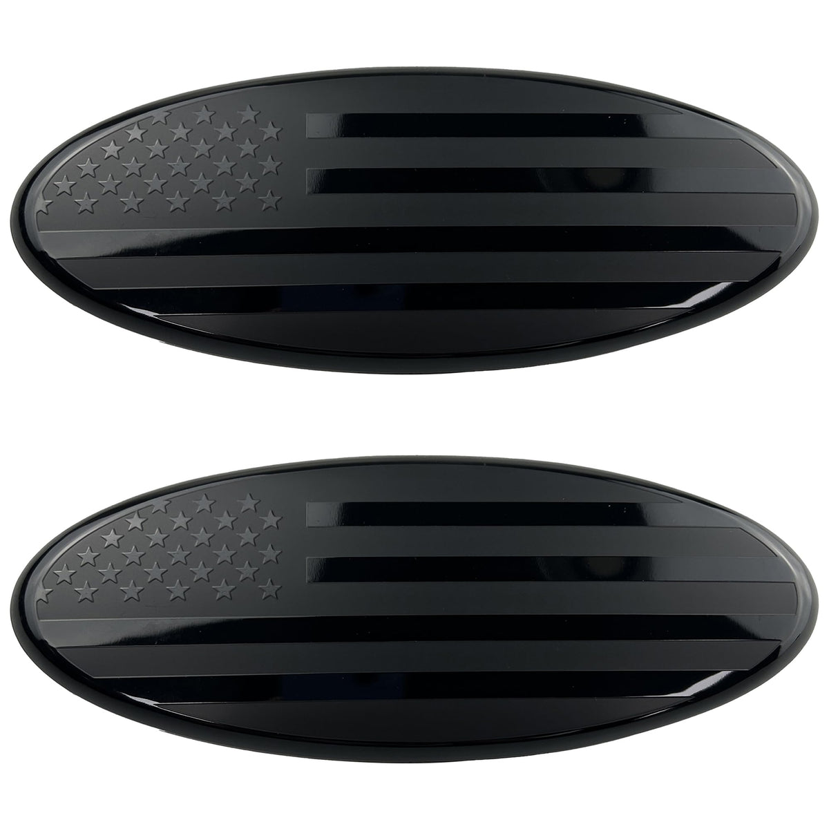 OUESAAS front grille emblem on truck showing bold American flag design and visual upgrade