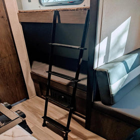 OUTPRIZE ladder in bedroom lifestyle scene illustrating durable styling and convenience benefit