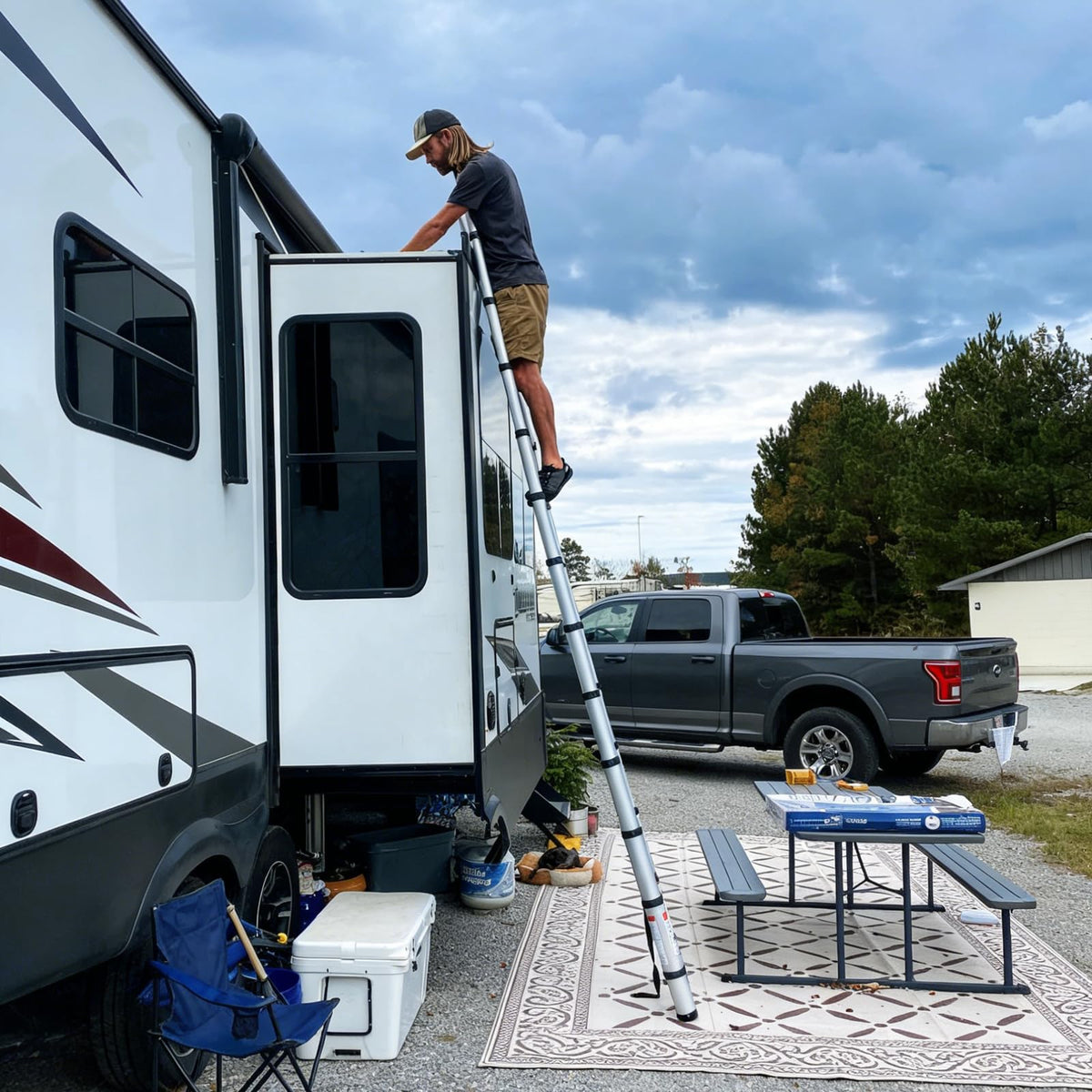 OUTPRIZE ladder in campsite lifestyle setting for convenient roof access