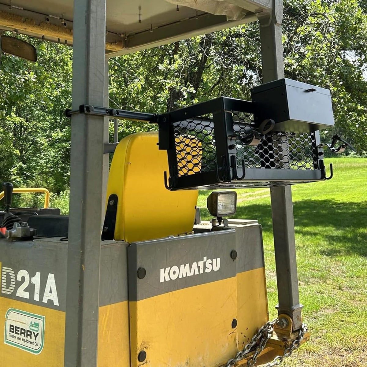 OUTPRIZE in field with tools demonstrating on-machine convenience and efficiency