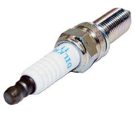 OVERSTOCKDIRECT NGK plug next to 5/8 inch socket showing hex size for correct installation