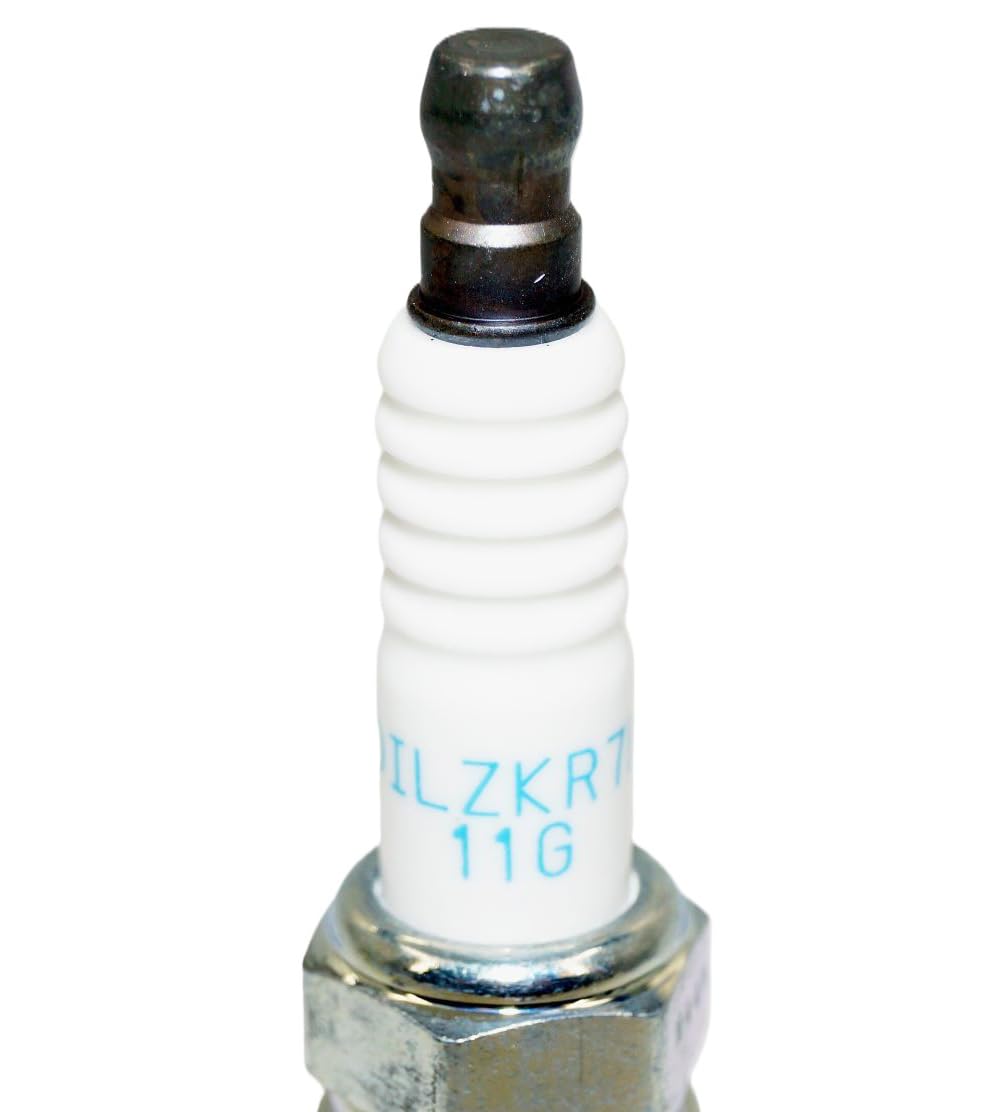 OVERSTOCKDIRECT NGK installed spark plug in an engine bay showing correct fitment