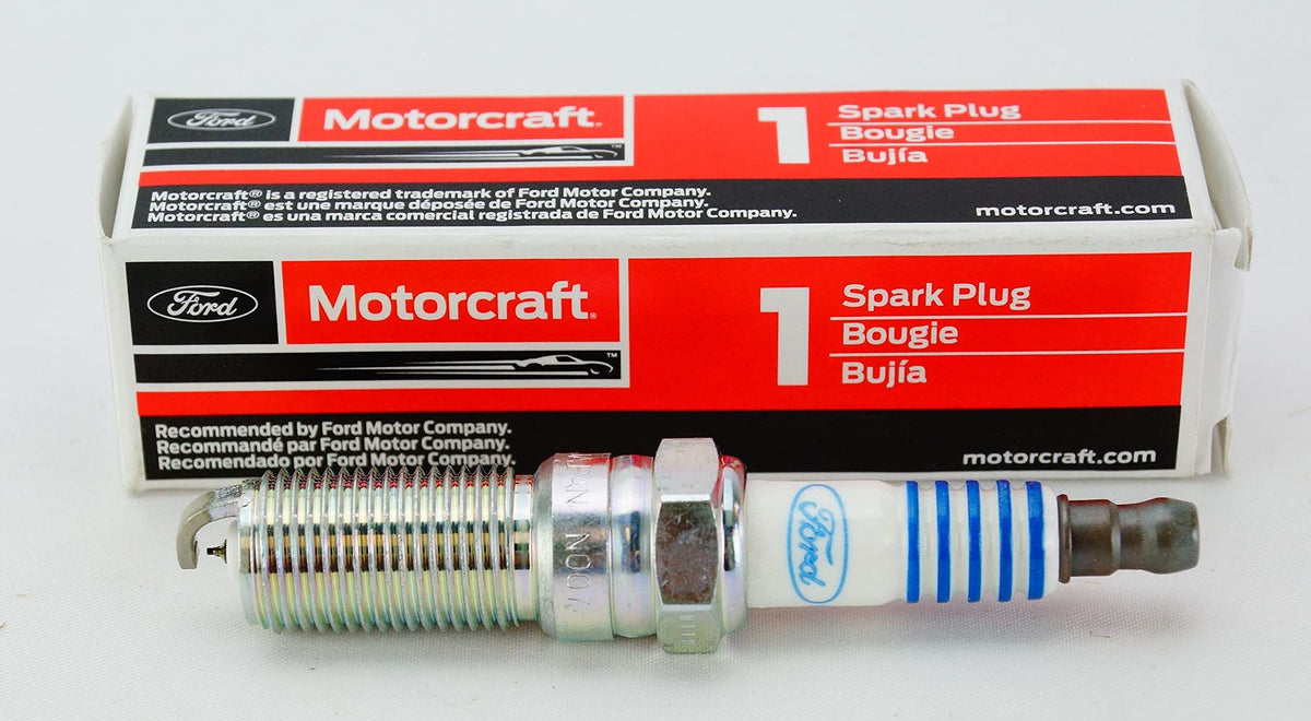 OVERSTOCKDIRECT plugs held in hand for scale showing compact OEM fit advantage