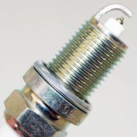 OVERSTOCKDIRECT spark plug installed in marine engine showing reliable fitment