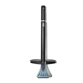 OXO extendable twister snow brush front view showing full head and scraper, easy clearing