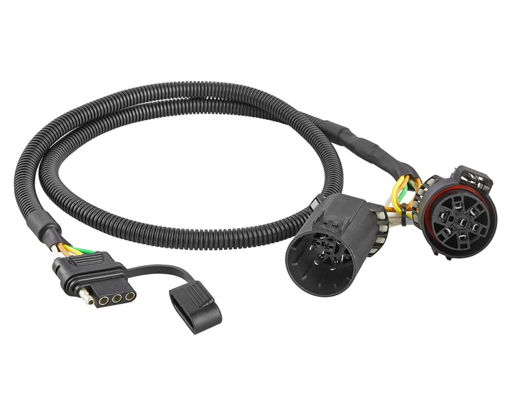 Oyviny front view of USCAR 7-pin to 4-pin harness showing plug benefits