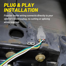Oyviny harness installed under bumper demonstrating plug‑and‑play fit