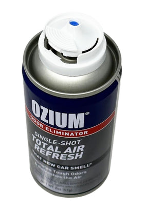 Ozium fogger deployed inside car illustrating fast odor removal benefit