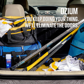 Ozium can near car air vent showing how it reaches hidden odor sources