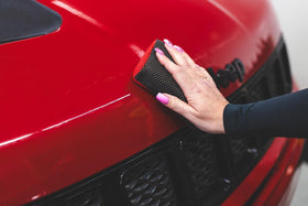 P & S RESET held in hand to show compact size and ergonomic grip benefit