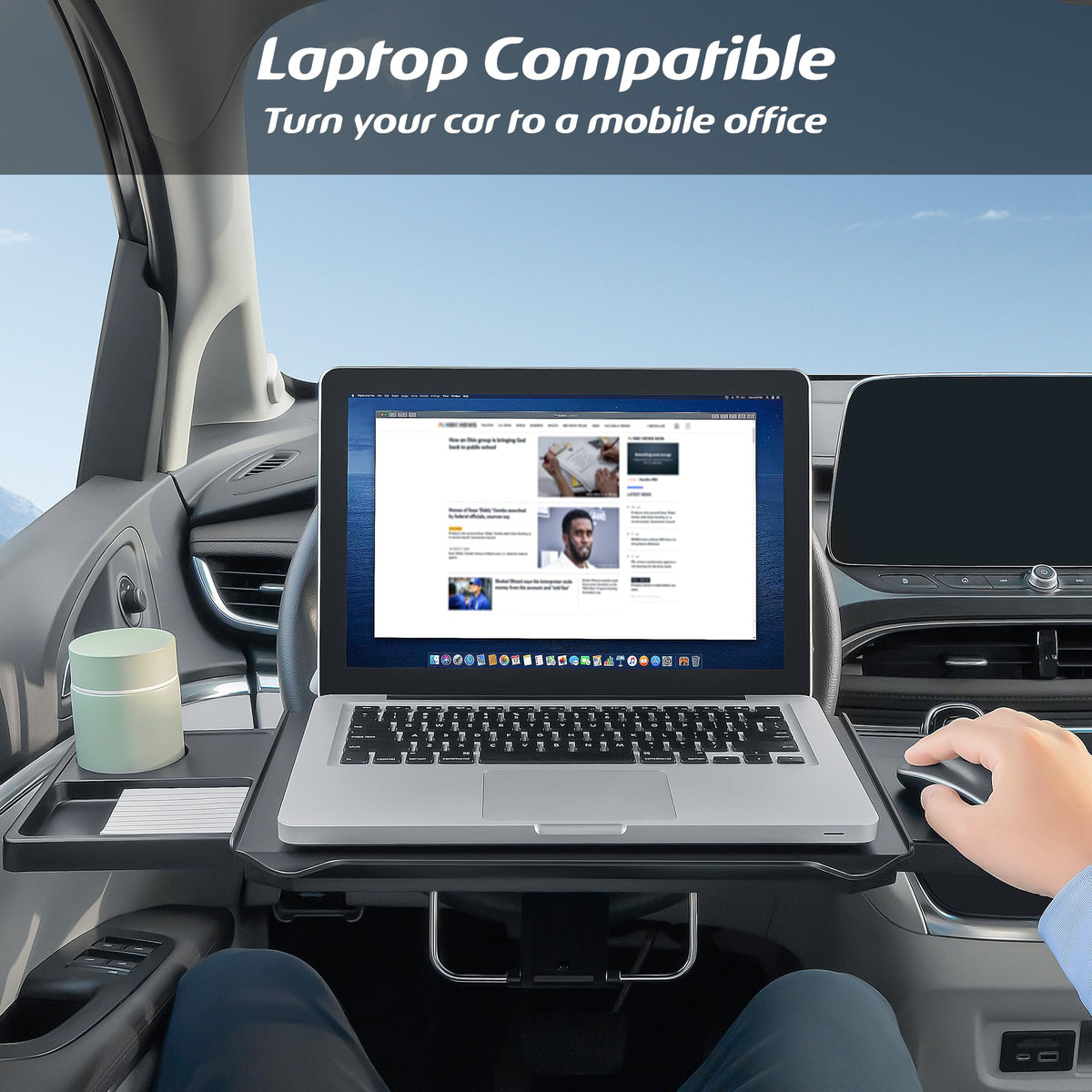 Paffenery tray mounted on steering wheel with laptop demonstrating stable workspace