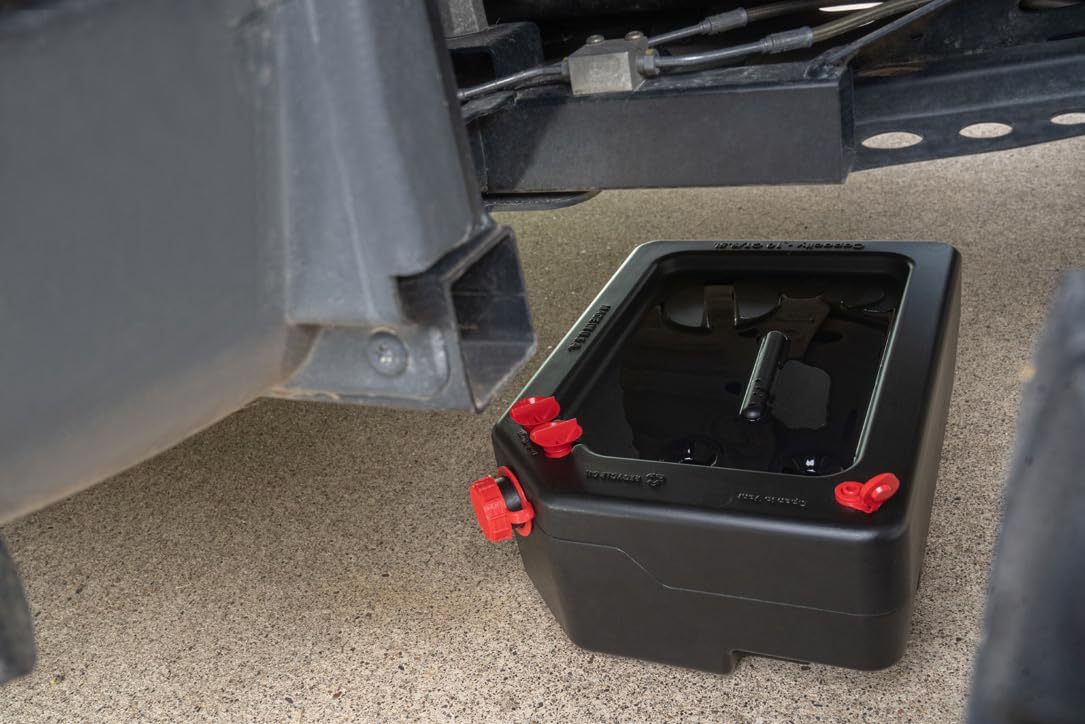 PAK drain pan in garage setting capturing oil under vehicle for cleaner maintenance