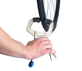 Park Tool BMT-1 next to a tire lever showing compact size and workshop compatibility
