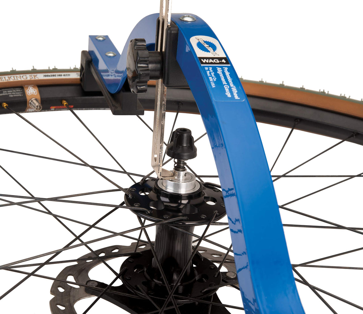 Park Tool WAG-4 mounted on a bicycle wheel illustrating quick on-bike alignment checks