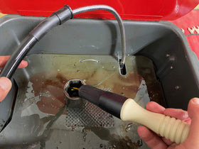 Parts Brush Oriflo hose connection detail showing 28-inch hose attachment for steady solvent flow