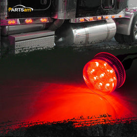 Partsam close-up of red lens and faceted reflector highlighting brighter output and clearer visibility