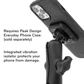 Peak Design adapter mounted in car demonstrating secure phone hold on commute